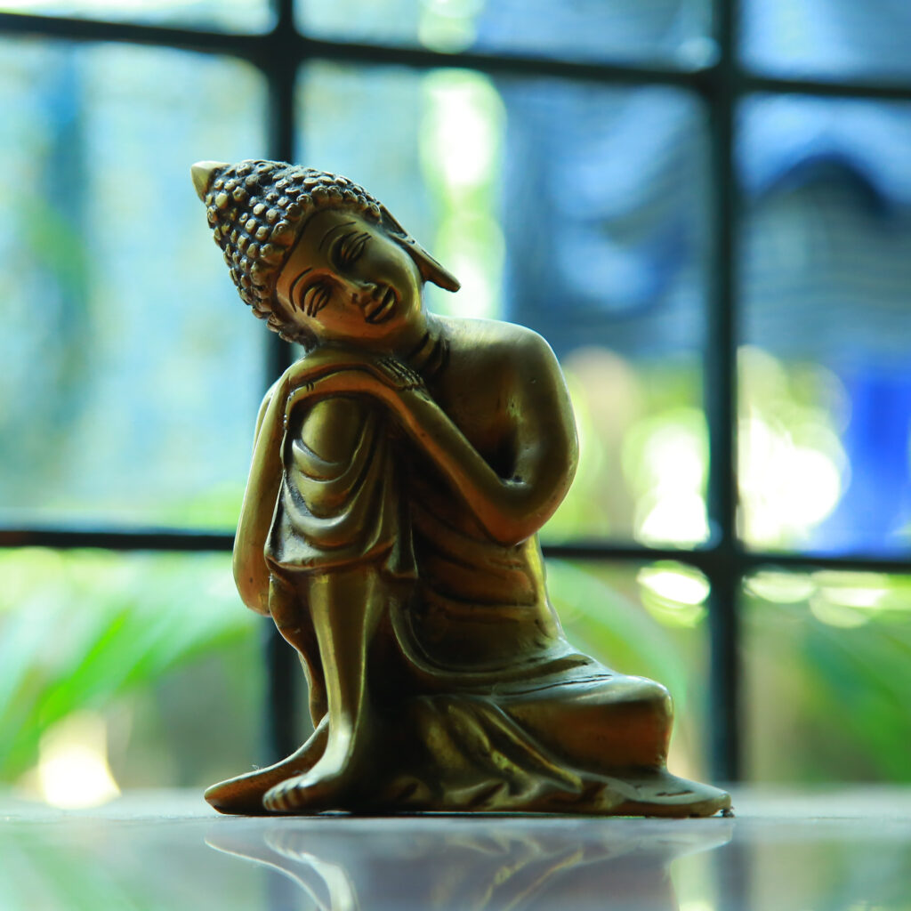 A statue of the Buddha in meditation.