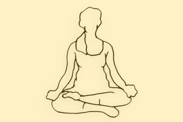 A woman sitting in meditation.