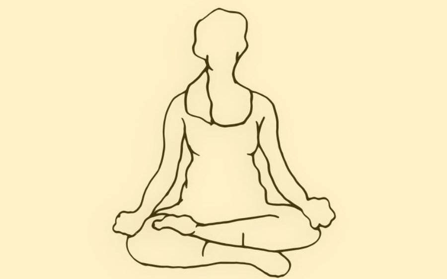 A woman sitting in meditation.